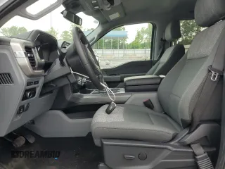 2023 Ford F-150 Lightning Pro z VIN 1FTVW1ELXPWG63466, wystawiony jako Copart lot #59163895 z przebiegiem Nie podano mil oraz Szkody całkowita. Historia ofert i sprzedaży dostępna na DreamBid. Obrazek 7.