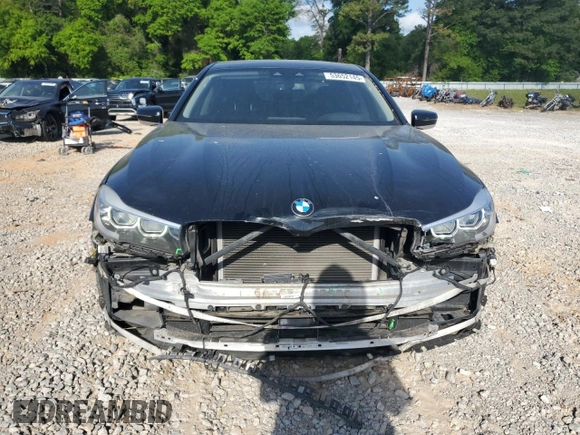 2017 BMW 7 Series 740i with VIN WBA7E2C57HG739482, listed as a Copart auction lot 53652145 with 102,418 mi miles and Salvage title. Bid and sale history available at DreamBid. Image 5.