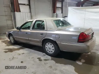 2005 Mercury Grand Marquis GS with VIN 2MEFM74WX5X614325, listed as a Copart auction lot 88117535 with 128,975 mi miles and Clean Title. Bid and sale history available at DreamBid. Image 2.