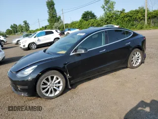 2020 Tesla Model 3 Standard Range Plus with VIN 5YJ3E1EA8LF609364, listed as a Copart auction lot 58828794 with 127,781 mi miles and Non Repairable. Bid and sale history available at DreamBid. Image 1.