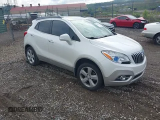 2015 Buick Encore Convenience with VIN KL4CJFSB9FB192053, listed as a IAAI auction lot 42181792 with 135,247 mi miles. Bid and sale history available at carsss.com. Image 1.