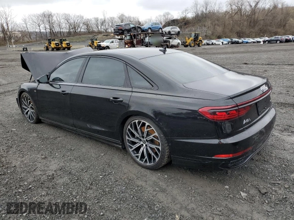 2022 Audi A8 with VIN WAULDAF85NN004895, listed as a Copart auction lot 51758025 with 61,164 mi miles and Salvage title. Bid and sale history available at DreamBid. Image 2.