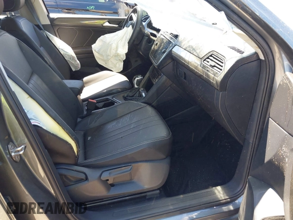 2024 Volkswagen Tiguan SE with VIN 3VVNB7AX6RM161369, listed as a IAAI auction lot 41888229 with 5,173 mi miles and . Bid and sale history available at DreamBid. Image 5.