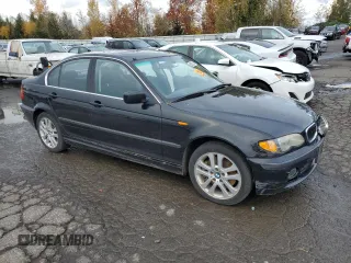 2002 BMW 3 Series 330xi with VIN WBAEW53482PG08312, listed as a Copart auction lot 80872734 with 180,306 mi miles and Salvage title. Bid and sale history available at DreamBid. Image 4.