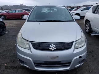 2007 Suzuki SX4 with VIN JS2YA411775100842, listed as a Copart auction lot 84701624 with 131,717 mi miles and Salvage Title. Bid and sale history available at carsss.com. Image 5.