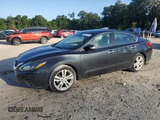 2016 Nissan Altima SL with VIN 1N4BL3AP1GC122006, listed as a Copart auction lot 65351235 with 103,047 mi miles and Salvage title. Bid and sale history available at DreamBid. Image 1.
