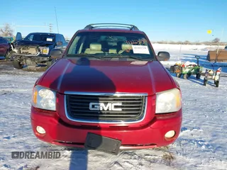 2005 GMC Envoy SLE with VIN 1GKET16S056147701, listed as a IAAI auction lot 41263739 with 179,455 mi miles. Bid and sale history available at carsss.com. Image 12.