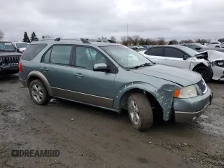 2005 Ford Freestyle SEL with VIN 1FMZK05125GA38245, listed as a Copart auction lot 86547584 with 257,252 mi miles and Salvage Title. Bid and sale history available at carsss.com. Image 4.