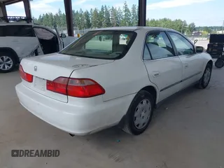 1998 Honda Accord LX with VIN 1HGCG5640WA004358, listed as a IAAI auction lot 42643808 with Not provided miles and . Bid and sale history available at DreamBid. Image 4.