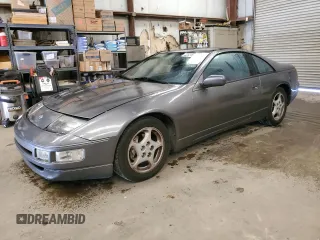 1992 Nissan 300ZX z VIN JN1RZ26H3NX521303, wystawiony jako Copart lot #44807265 z przebiegiem 135 626 mil mil oraz Tytuł czysty. Historia ofert i sprzedaży dostępna na DreamBid. Obrazek 1.