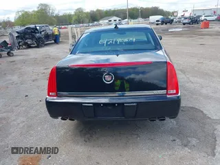 2009 Cadillac DTS 1SC z VIN 1G6KD57Y29U141800, wystawiony jako IAAI lot #42190874 z przebiegiem 115 043 mil mil oraz . Historia ofert i sprzedaży dostępna na DreamBid. Obrazek 16.