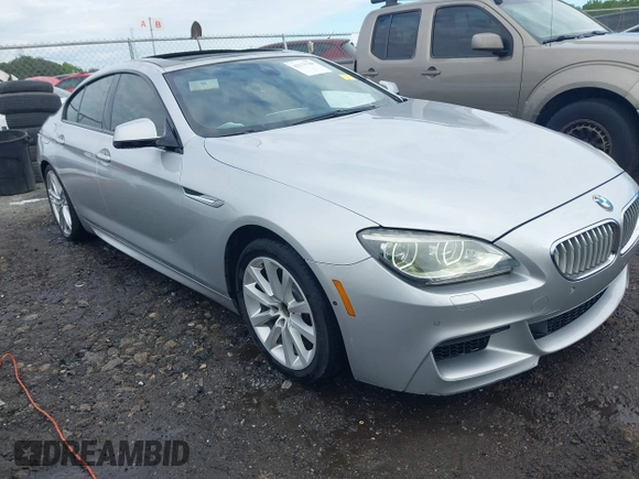2014 BMW 6 Series 650i z VIN WBA6B2C58ED129639, wystawiony jako IAAI lot #42171786 z przebiegiem 108 677 mil mil oraz . Historia ofert i sprzedaży dostępna na DreamBid. Obrazek 1.
