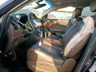 2015 Infiniti QX70 with VIN JN8CS1MU1FM381938, listed as a Copart auction lot 53502405 with Not provided miles and Salvage title. Bid and sale history available at DreamBid. Image 7.