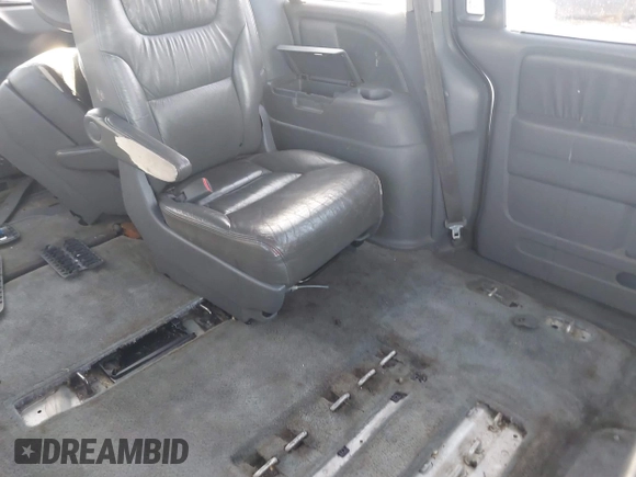 2005 Honda Odyssey TOURING with VIN 5FNRL38875B004209, listed as a IAAI auction lot 42003057 with 242,794 mi miles. Bid and sale history available at carsss.com. Image 8.