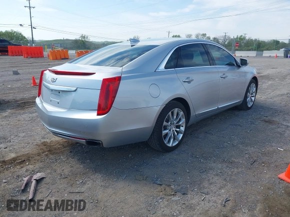 2016 Cadillac XTS Luxury Collection z VIN 2G61M5S33G9107107, wystawiony jako IAAI lot #42072608 z przebiegiem 130 542 mil mil oraz . Historia ofert i sprzedaży dostępna na DreamBid. Obrazek 4.
