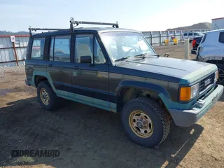 1990 Isuzu Trooper с VIN JACCH58EXL7903060, выставлен на аукционе IAAI как лот 42516100 с пробегом 189 700 миль миль и . История ставок и продаж доступна на DreamBid. Изображение 1.