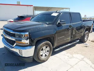 2018 Chevrolet Silverado 1500 LT with VIN 3GCPCREC9JG569925, listed as a IAAI auction lot 42086625 with 184,594 mi miles and . Bid and sale history available at DreamBid. Image 2.