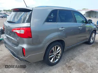 2014 Kia Sorento SX z VIN 5XYKWDA75EG461948, wystawiony jako IAAI lot #42180084 z przebiegiem 123 917 mil mil oraz . Historia ofert i sprzedaży dostępna na DreamBid. Obrazek 4.
