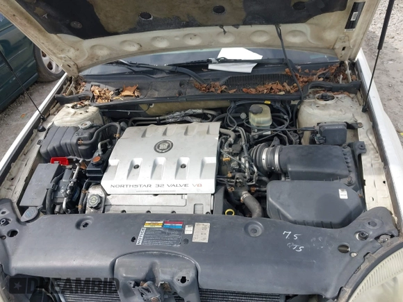 2000 Cadillac DeVille z VIN 1G6KD54Y2YU319515, wystawiony jako IAAI lot #41638065 z przebiegiem Nie podano mil oraz . Historia ofert i sprzedaży dostępna na DreamBid. Obrazek 10.