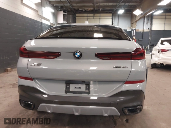2025 BMW X6 xDrive40i with VIN 5UX33EX04S9Z44291, listed as a IAAI auction lot 41827897 with 1,053 mi miles. Bid and sale history available at carsss.com. Image 16.