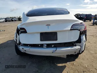 2023 Tesla Model 3 с VIN 5YJ3E1EA6PF427300, выставлен на аукционе Copart как лот 61457055 с пробегом 44 438 миль миль и Списание • Salvage title. История ставок и продаж доступна на DreamBid. Изображение 6.