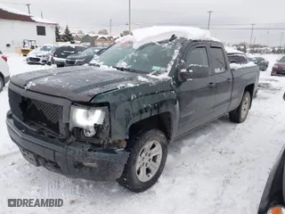2015 Chevrolet Silverado 1500 LT with VIN 1GCVKREC9FZ382895, listed as a IAAI auction lot 40976186 with 142,998 mi miles. Bid and sale history available at carsss.com. Image 2.
