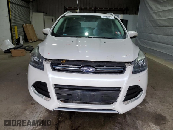 2016 Ford Escape Titanium with VIN 1FMCU9J93GUB78230, listed as a Copart auction lot 51661025 with 98,515 mi miles and Salvage Title. Bid and sale history available at DreamBid. Image 5.