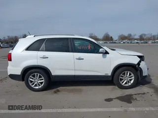 2014 Kia Sorento LX with VIN 5XYKTCA63EG545549, listed as a IAAI auction lot 41841324 with 173,813 mi miles and . Bid and sale history available at carsss.com. Image 13.