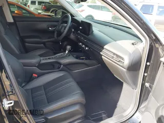 2024 Honda HR-V EX-L z VIN 3CZRZ1H7XRM736789, wystawiony jako IAAI lot #41934334 z przebiegiem 26 084 mil mil oraz . Historia ofert i sprzedaży dostępna na DreamBid. Obrazek 5.