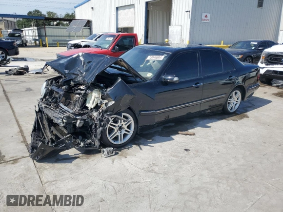 2001 Mercedes-Benz E-Class AWD with VIN WDBJF82J21X056553, listed as a Copart auction lot 73046694 with 0 mi miles and Salvage Title. Bid and sale history available at carsss.com. Image 1.