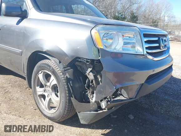 2013 Honda Pilot EX-L with VIN 5FNYF3H79DB037477, listed as a IAAI auction lot 41649734 with 161,902 mi miles and . Bid and sale history available at DreamBid. Image 6.