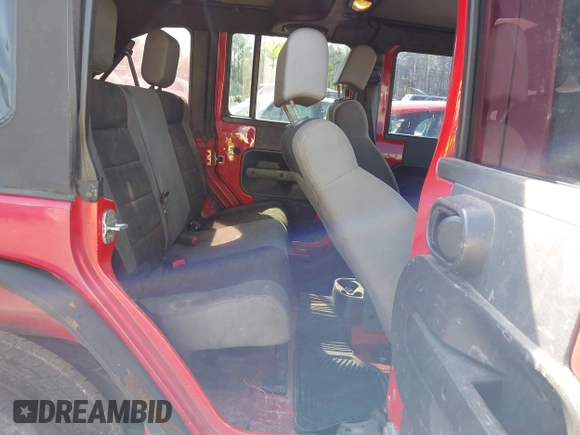 2007 Jeep Wrangler Unlimited X with VIN 1J4GB39197L150245, listed as a IAAI auction lot 41920390 with 239,532 mi miles and . Bid and sale history available at DreamBid. Image 5.