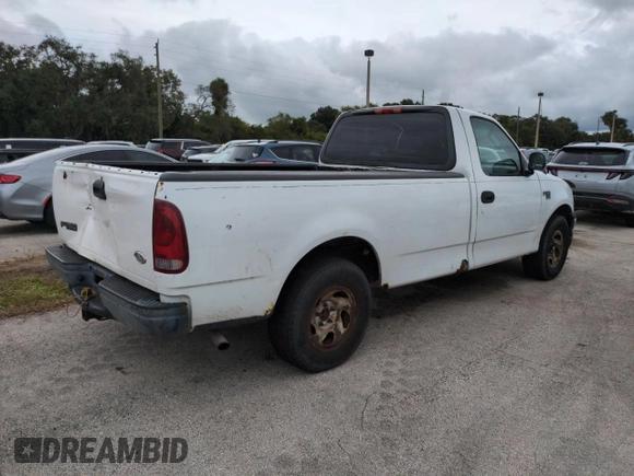 2003 Ford F-150 XL with VIN 1FTRF17W03NA02988, listed as a Copart auction lot 77209084 with Not Provided miles and Salvage Title. Bid and sale history available at DreamBid. Image 3.