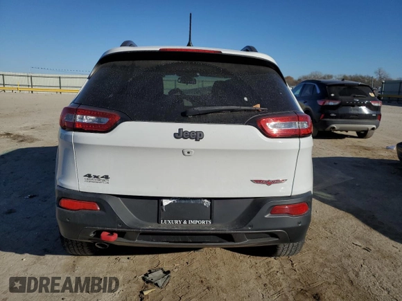 2018 Jeep Cherokee Trailhawk with VIN 1C4PJMBB1JD549783, listed as a Copart auction lot 77056883 with 84,404 mi miles and Non repairable. Bid and sale history available at DreamBid. Image 6.