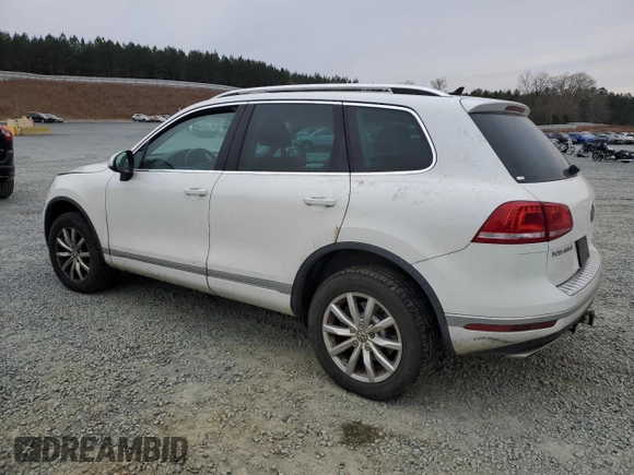 2015 Volkswagen Touareg Lux с VIN WVGEP9BP2FD002247, выставлен на аукционе Copart как лот 41924615 с пробегом 127 543 миль миль и Списание • Salvage title. История ставок и продаж доступна на DreamBid. Изображение 2.