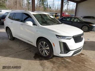 2020 Cadillac XT6 FWD Premium Luxury with VIN 1GYKPCRS3LZ137180, listed as a IAAI auction lot 41680583 with 68,937 mi miles. Bid and sale history available at carsss.com. Image 1.