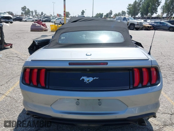 2021 Ford Mustang EcoBoost z VIN 1FATP8UH2M5120162, wystawiony jako IAAI lot #42561125 z przebiegiem 55 360 mil mil oraz . Historia ofert i sprzedaży dostępna na DreamBid. Obrazek 17.