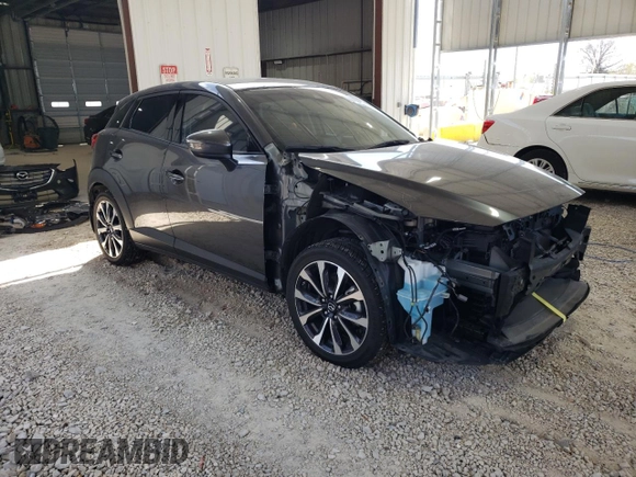 2019 Mazda CX-3 Touring z VIN JM1DKFC75K1439294, wystawiony jako Copart lot #52967955 z przebiegiem 16 966 mil mil oraz Czysty tytuł • Clean title. Historia ofert i sprzedaży dostępna na DreamBid. Obrazek 4.