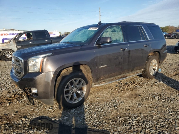 2015 GMC Yukon SLT with VIN 1GKS1BKC0FR735059, listed as a Copart auction lot 42960685 with 242,220 mi miles and Salvage Title. Bid and sale history available at carsss.com. Image 1.