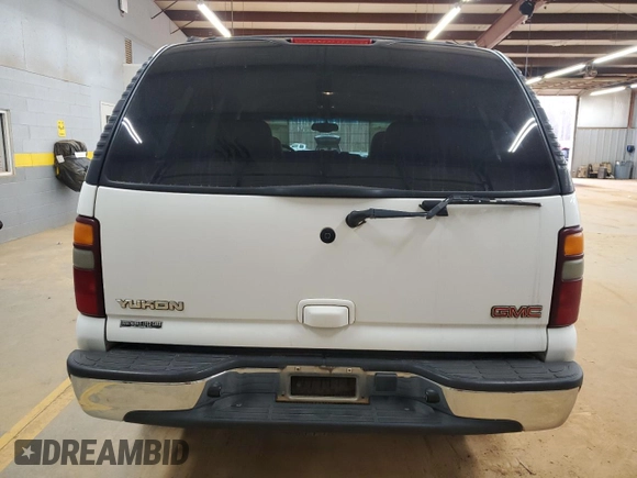 2003 GMC Yukon SLT with VIN 1GKEK13V03J153137, listed as a Copart auction lot 46810965 with 271,278 mi miles and Salvage Title. Bid and sale history available at carsss.com. Image 6.
