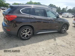 2017 BMW X1 xDrive28i z VIN WBXHT3C39H5F72979, wystawiony jako Copart lot #56003625 z przebiegiem 101 184 mil mil oraz Szkoda całkowita • Salvage title. Historia ofert i sprzedaży dostępna na DreamBid. Obrazek 3.