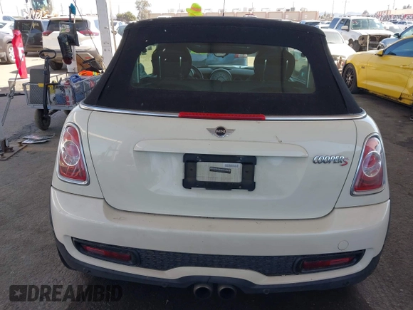2014 MINI Convertible S with VIN WMWZP3C5XET706911, listed as a IAAI auction lot 42217410 with 54,649 mi miles and . Bid and sale history available at DreamBid. Image 16.