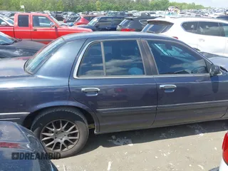 2000 Ford Crown Victoria LX с VIN 2FAFP74W4YX116561, выставлен на аукционе IAAI как лот 42101875 с пробегом Не указан миль и . История ставок и продаж доступна на DreamBid. Изображение 13.