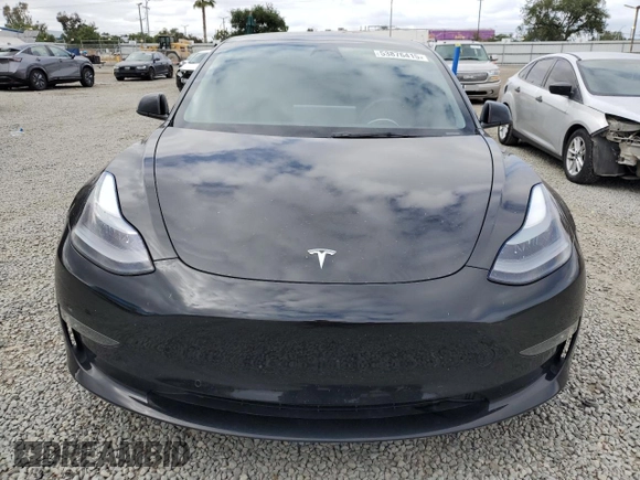 2022 Tesla Model 3 Long Range with VIN 5YJ3E1EB6NF334914, listed as a Copart auction lot 53876415 with 52,875 mi miles and Salvage Title. Bid and sale history available at carsss.com. Image 5.