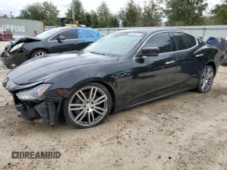 2015 Maserati Ghibli S Q4 with VIN ZAM57RTA8F1144369, listed as a Copart auction lot 77810033 with 82,749 mi miles. Bid and sale history available at carsss.com. Image 1.