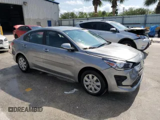 2023 Kia Rio LX with VIN 3KPA24AD3PE592664, listed as a Copart auction lot 50747625 with 8,014 mi miles and Salvage Title. Bid and sale history available at DreamBid. Image 4.