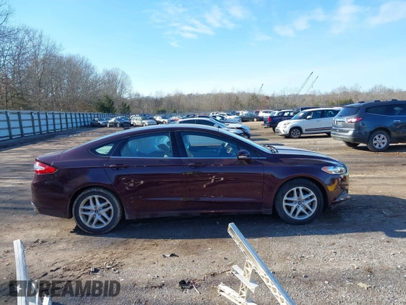 2013 Ford Fusion SE z VIN 3FA6P0H71DR198090, wystawiony jako IAAI lot #41211029 z przebiegiem 60 726 mil mil oraz . Historia ofert i sprzedaży dostępna na DreamBid. Obrazek 13.