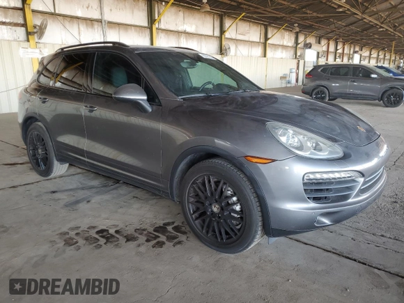 2012 Porsche Cayenne S Hybrid z VIN WP1AE2A27CLA92565, wystawiony jako Copart lot #82221214 z przebiegiem 130 210 mil mil oraz Szkody całkowita. Historia ofert i sprzedaży dostępna na DreamBid. Obrazek 4.