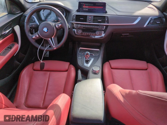 2018 BMW M2 z VIN WBS1J5C59J7B70092, wystawiony jako Copart lot #52558485 z przebiegiem 2 614 mil mil oraz Szkoda całkowita • Salvage title. Historia ofert i sprzedaży dostępna na DreamBid. Obrazek 8.