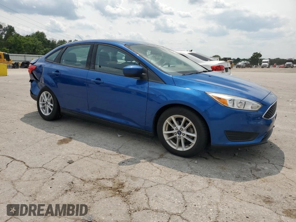 2018 Ford Focus SE with VIN 1FADP3F23JL214428, listed as a Copart auction lot 60552465 with 33,699 mi miles and Salvage title. Bid and sale history available at DreamBid. Image 1.